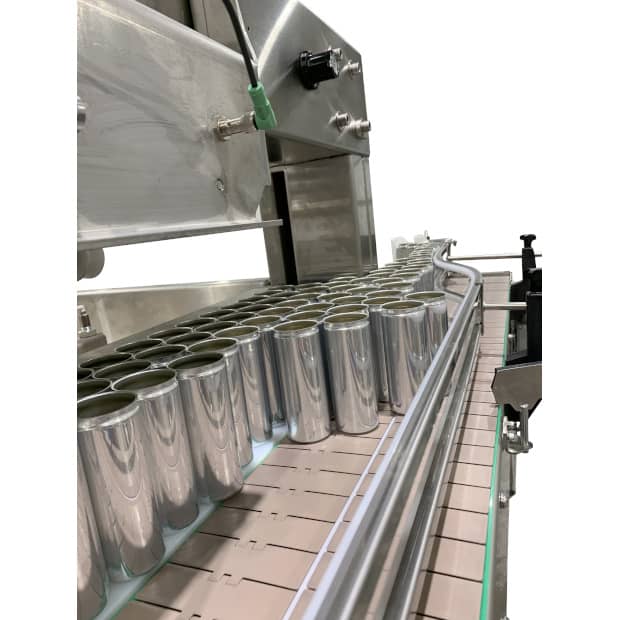 Aluminum can on a depalletizer's conveyor